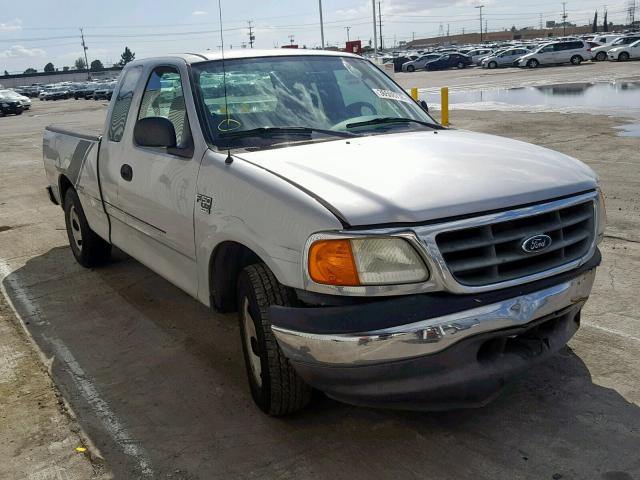 2FTRX17W04CA60524 - 2004 FORD F-150 HERI SILVER photo 1