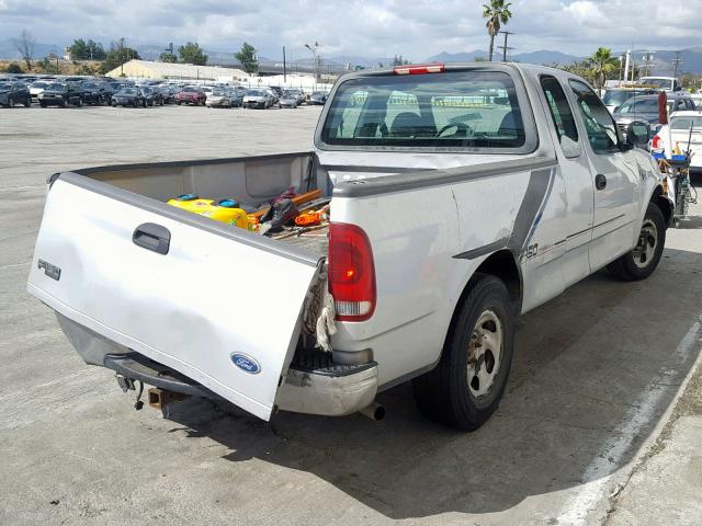 2FTRX17W04CA60524 - 2004 FORD F-150 HERI SILVER photo 4