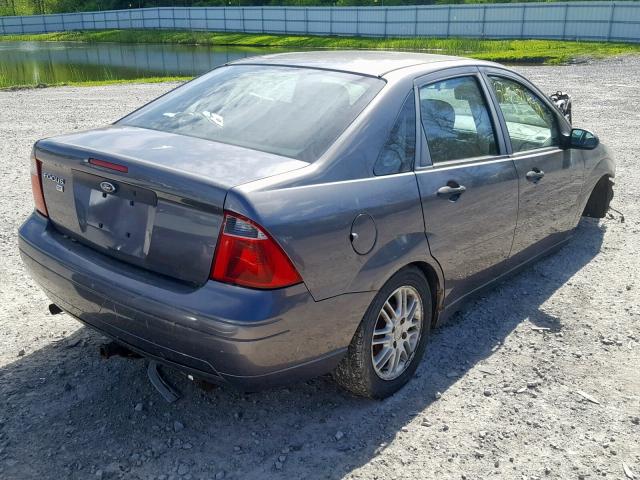 1FAFP34N27W259485 - 2007 FORD FOCUS ZX4 GRAY photo 4