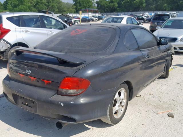 KMHJG35F01U266767 - 2001 HYUNDAI TIBURON BLACK photo 4