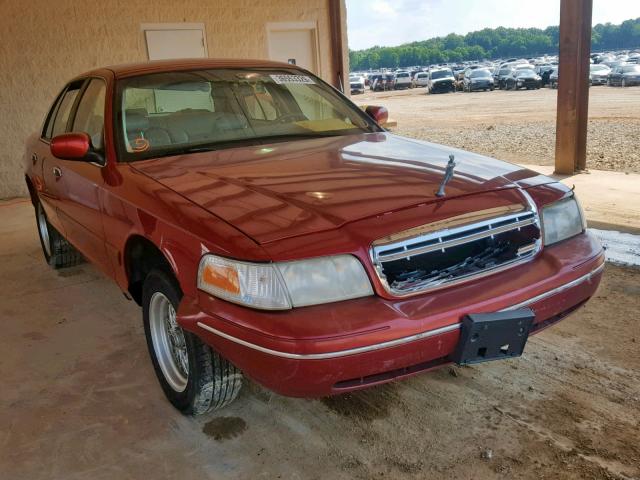 2FAFP74W0YX147435 - 2000 FORD CROWN VICT RED photo 1