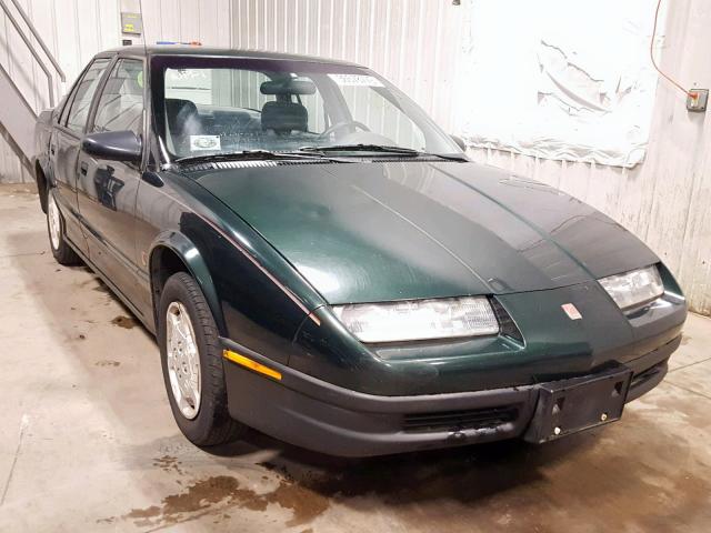 1G8ZG5286SZ393207 - 1995 SATURN SL1 GREEN photo 1