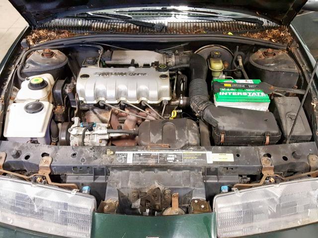 1G8ZG5286SZ393207 - 1995 SATURN SL1 GREEN photo 7