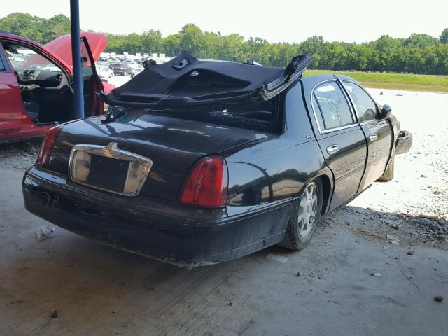 1LNHM82W42Y671162 - 2002 LINCOLN TOWN CAR S BLACK photo 4