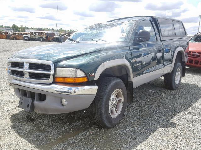 1B7GG26Y4XS216516 - 1999 DODGE DAKOTA GREEN photo 2