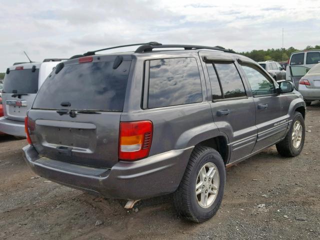 1J4GW48N34C120779 - 2004 JEEP GRAND CHER GRAY photo 4