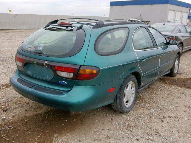 1FALP57U3TA193781 - 1996 FORD TAURUS GL GREEN photo 4