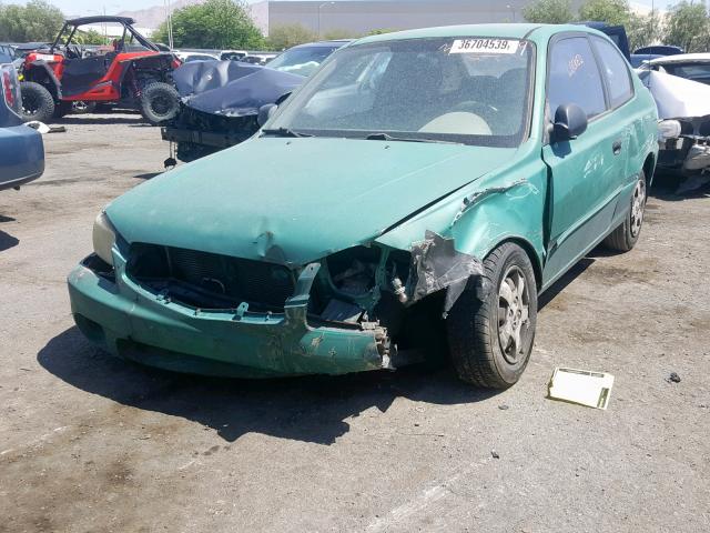 KMHCG35C41U090823 - 2001 HYUNDAI ACCENT GS GREEN photo 2