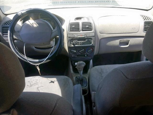 KMHCG35C41U090823 - 2001 HYUNDAI ACCENT GS GREEN photo 9