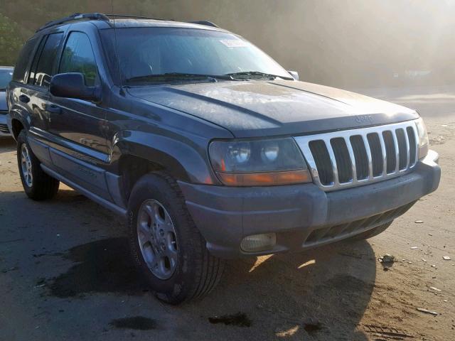 1J4GW58N9XC790573 - 1999 JEEP GRAND CHER GRAY photo 1