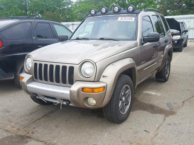 1J4GL38K62W366875 - 2002 JEEP LIBERTY RE GOLD photo 2