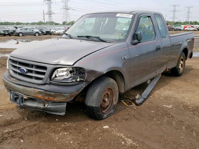 2FTRX17214CA98681 - 2004 FORD F-150 HERI GRAY photo 2