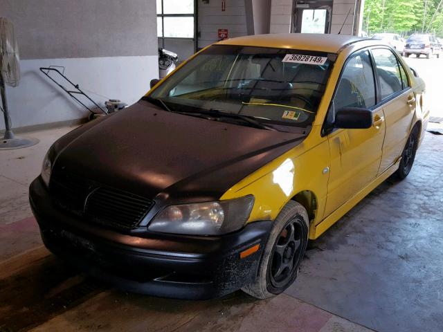 JA3AJ86E32U017551 - 2002 MITSUBISHI LANCER OZ YELLOW photo 2