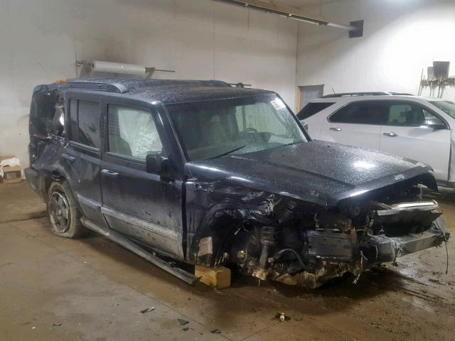 1J8HG48N06C119902 - 2006 JEEP COMMANDER BLACK photo 1