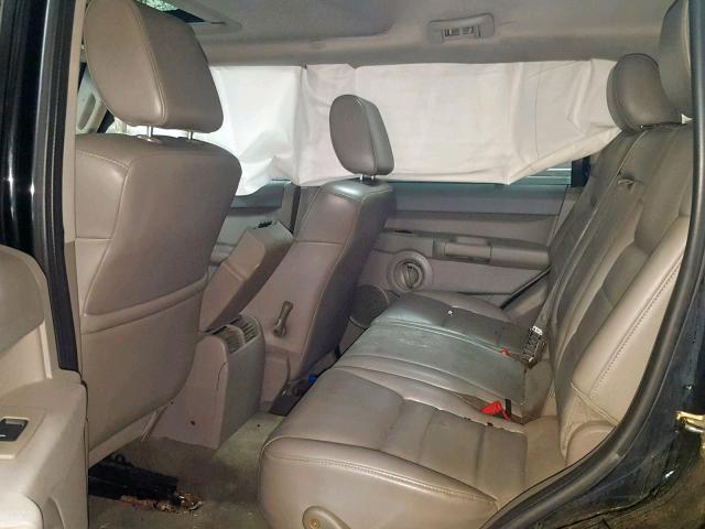 1J8HG48N06C119902 - 2006 JEEP COMMANDER BLACK photo 6