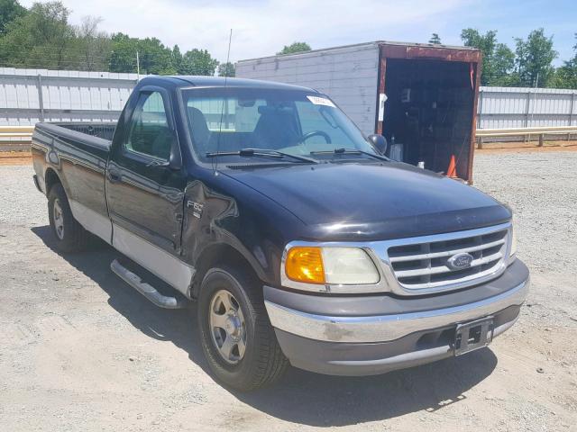 2FTRF17W34CA12843 - 2004 FORD F-150 HERI BLACK photo 1