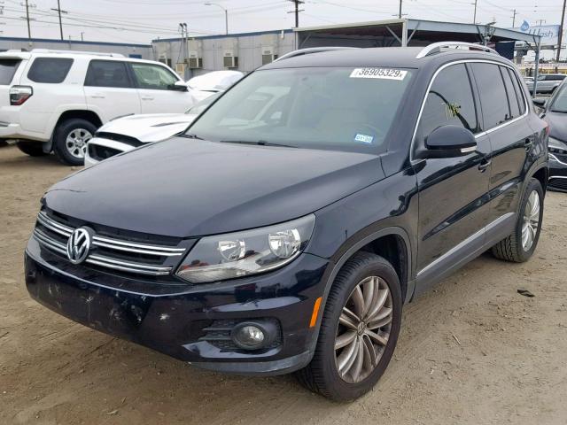 WVGAV3AX7EW541582 - 2014 VOLKSWAGEN TIGUAN S BLACK photo 2