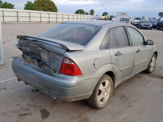 1FAFP34N45W246153 - 2005 FORD FOCUS ZX4 GREEN photo 4