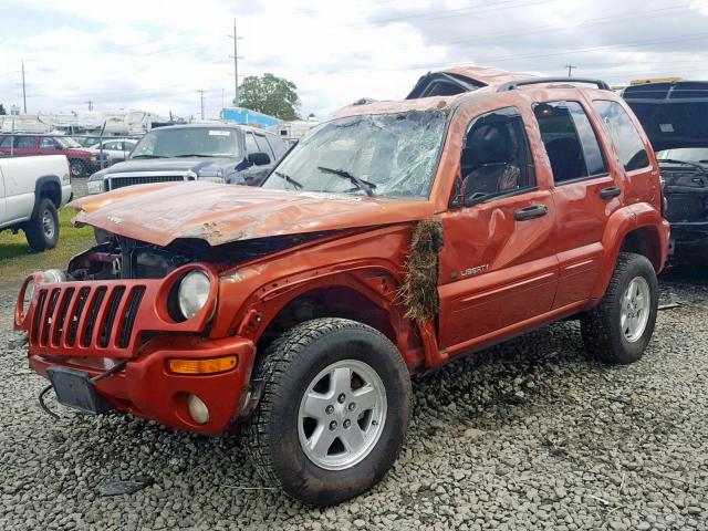 1J4GL58K22W177023 - 2002 JEEP LIBERTY LI ORANGE photo 2