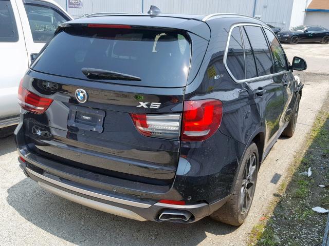 5UXKT0C51J0W00324 - 2018 BMW X5 XDR40E BLACK photo 4