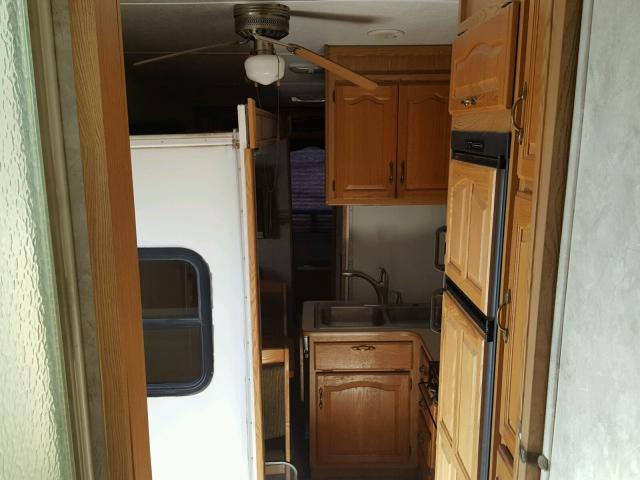 4YDF328254F703001 - 2004 KEYSTONE MONTANA WHITE photo 5