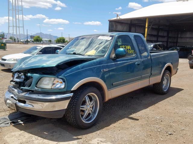 1FTDX176XVKA77175 - 1997 FORD F150 GREEN photo 2