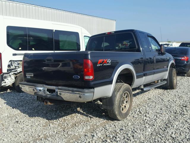 1FTWX31P15EC91508 - 2005 FORD F350 SRW S BLACK photo 4