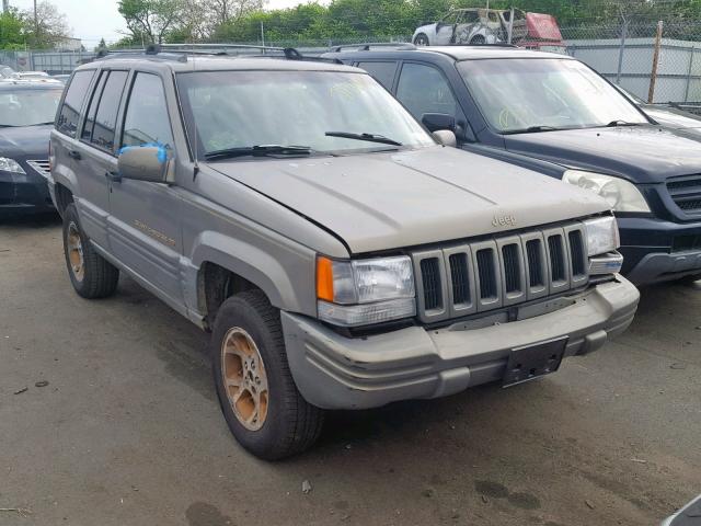 1J4GZ78Y4TC394543 - 1996 JEEP GRAND CHER TAN photo 1