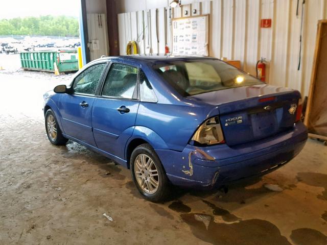 1FAFP34N15W150335 - 2005 FORD FOCUS ZX4 BLUE photo 3