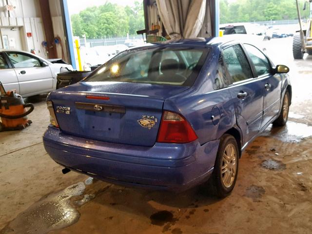 1FAFP34N15W150335 - 2005 FORD FOCUS ZX4 BLUE photo 4