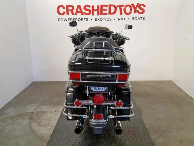1HD1FC4388Y613942 - 2008 HARLEY-DAVIDSON FLHTCUI BLACK photo 4