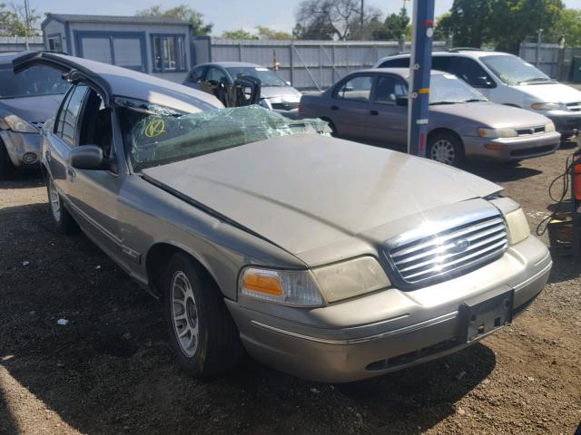 2FAFP74W0XX104406 - 1999 FORD CROWN VICT GRAY photo 1