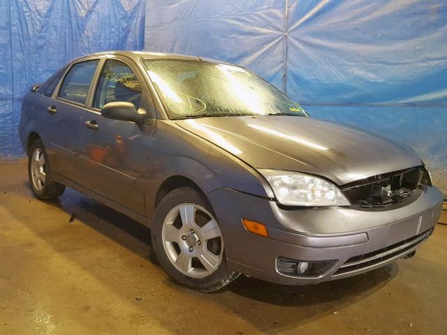 1FAHP34N17W255596 - 2007 FORD FOCUS ZX4 GRAY photo 1