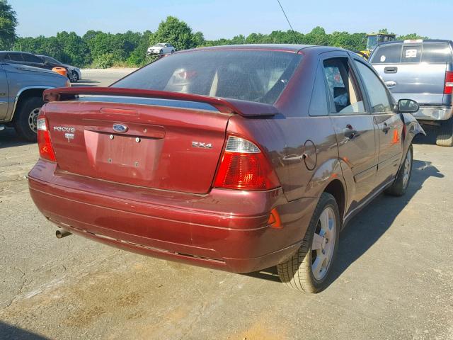 1FAHP34N26W136048 - 2006 FORD FOCUS ZX4 MAROON photo 4