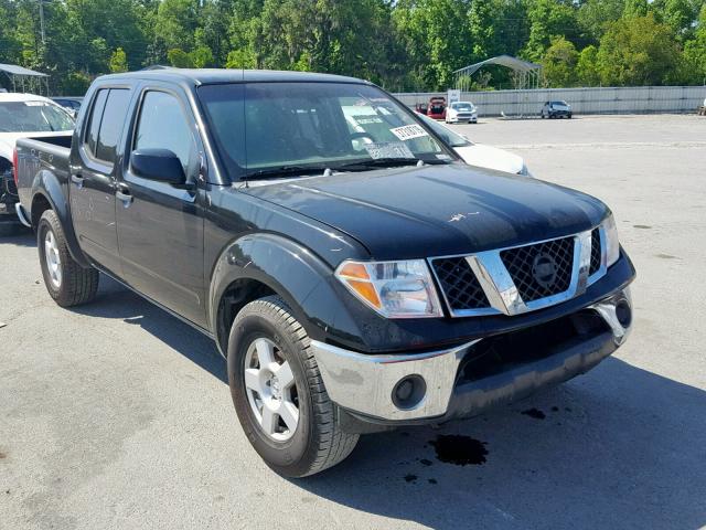 1N6AD07U06C477565 - 2006 NISSAN FRONTIER C BLACK photo 1