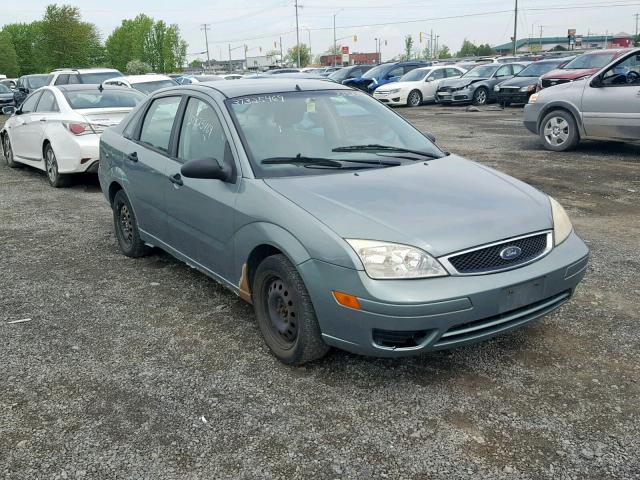 1FAFP34N95W208661 - 2005 FORD FOCUS ZX4 GREEN photo 1