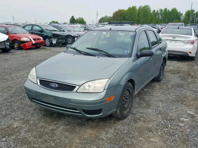 1FAFP34N95W208661 - 2005 FORD FOCUS ZX4 GREEN photo 2