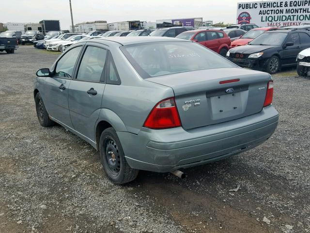 1FAFP34N95W208661 - 2005 FORD FOCUS ZX4 GREEN photo 3