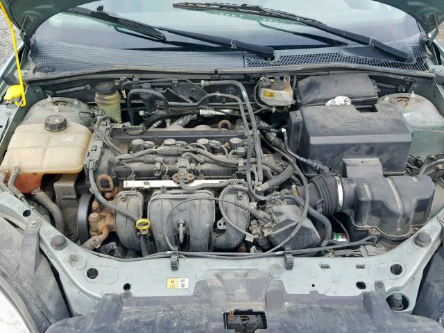 1FAFP34N95W208661 - 2005 FORD FOCUS ZX4 GREEN photo 7