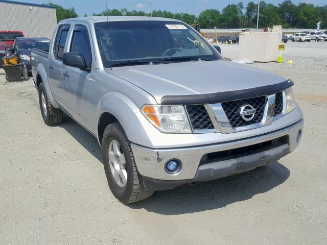 1N6AD07U95C439301 - 2005 NISSAN FRONTIER C SILVER photo 1