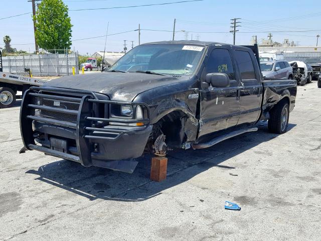 1FTSW30L72EC83957 - 2002 FORD F350 SRW S BLACK photo 2