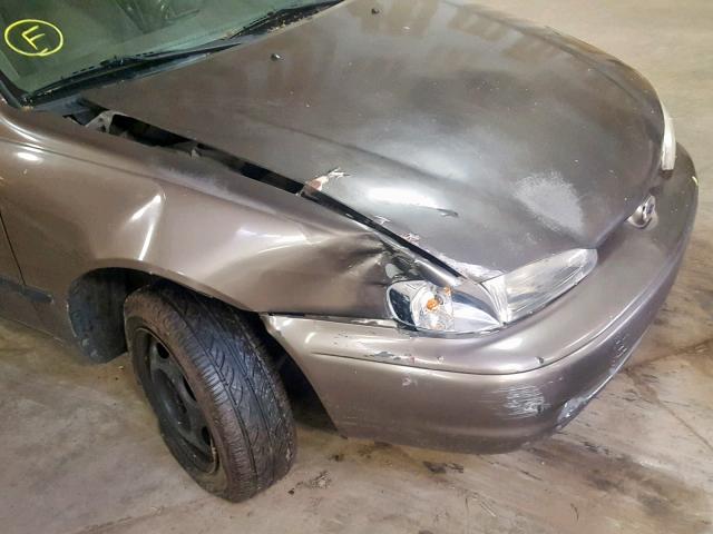 1Y1SK528XYZ405188 - 2000 CHEVROLET GEO PRIZM SILVER photo 9