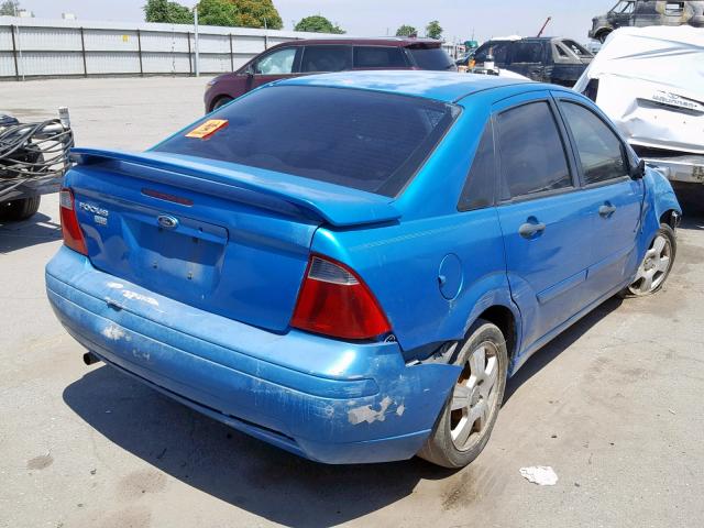 1FAHP34N57W173340 - 2007 FORD FOCUS ZX4 BLUE photo 4