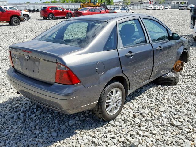 1FAFP34N37W321248 - 2007 FORD FOCUS ZX4 GRAY photo 4