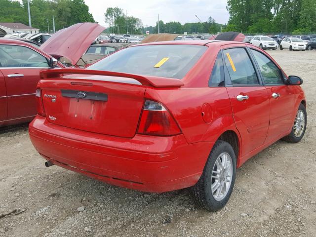 1FAFP34N77W330342 - 2007 FORD FOCUS ZX4 RED photo 4