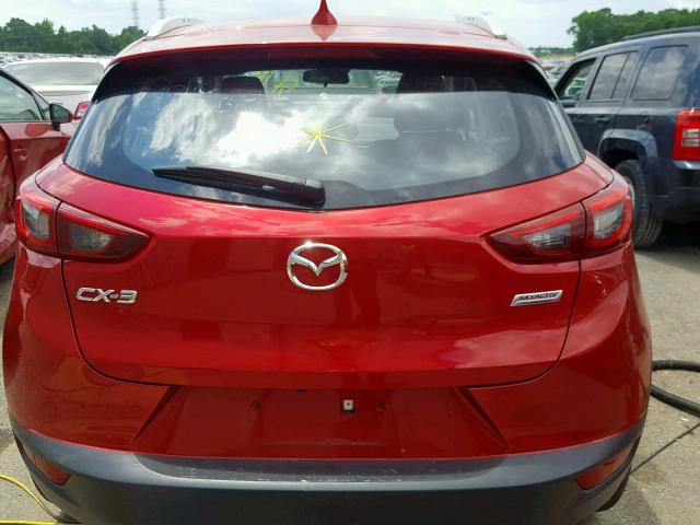 JM1DKDD77J0326728 - 2018 MAZDA CX-3 GRAND RED photo 9