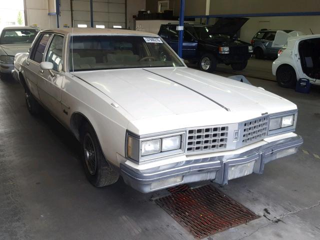 1G3BY69Y0F9131978 - 1985 OLDSMOBILE DELTA 88 R CREAM photo 1