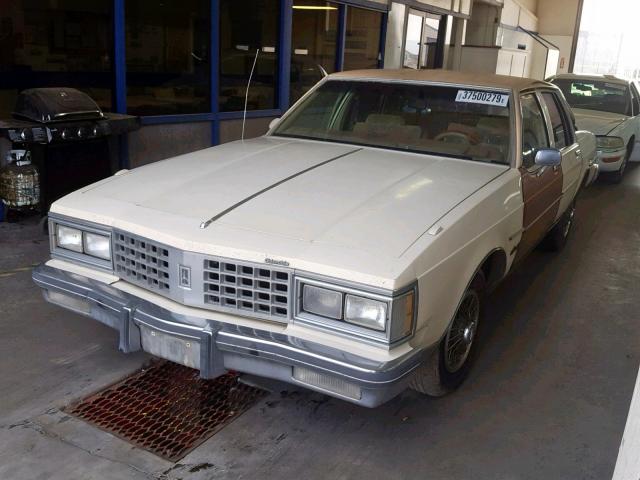 1G3BY69Y0F9131978 - 1985 OLDSMOBILE DELTA 88 R YELLOW photo 2