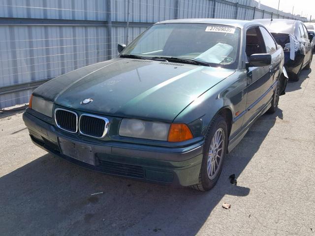 WBABF8337XEH64677 - 1999 BMW 323 IS AUT GREEN photo 2