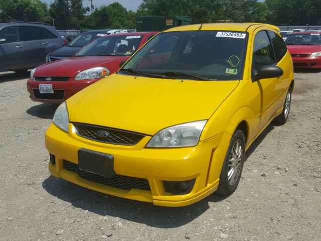 1FAFP31N27W159083 - 2007 FORD FOCUS ZX3 YELLOW photo 2